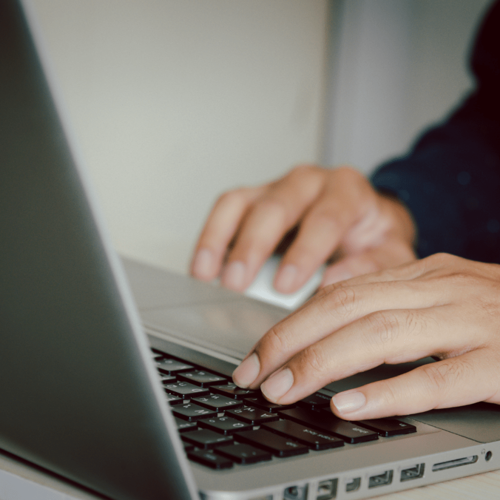 freelance digital marketer in malappuram, a man typing the laptop